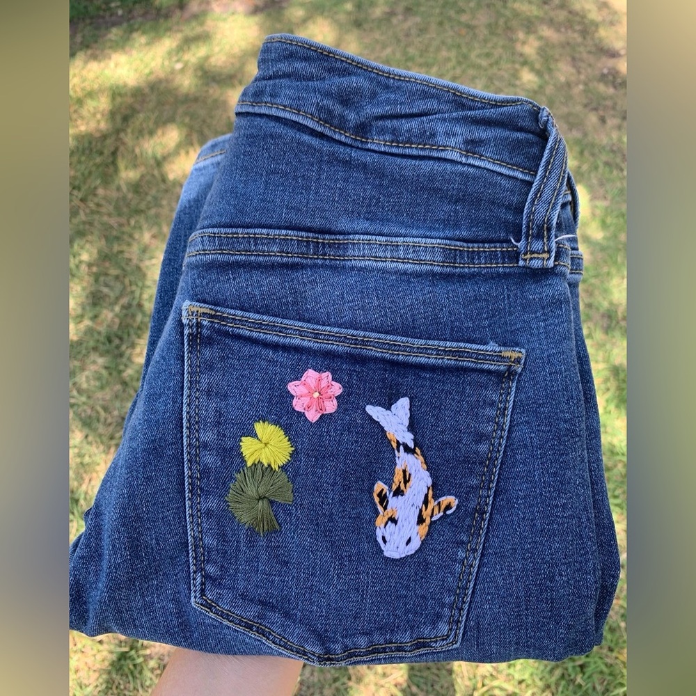 Hand embroidered koi fish Universal Thread jeans